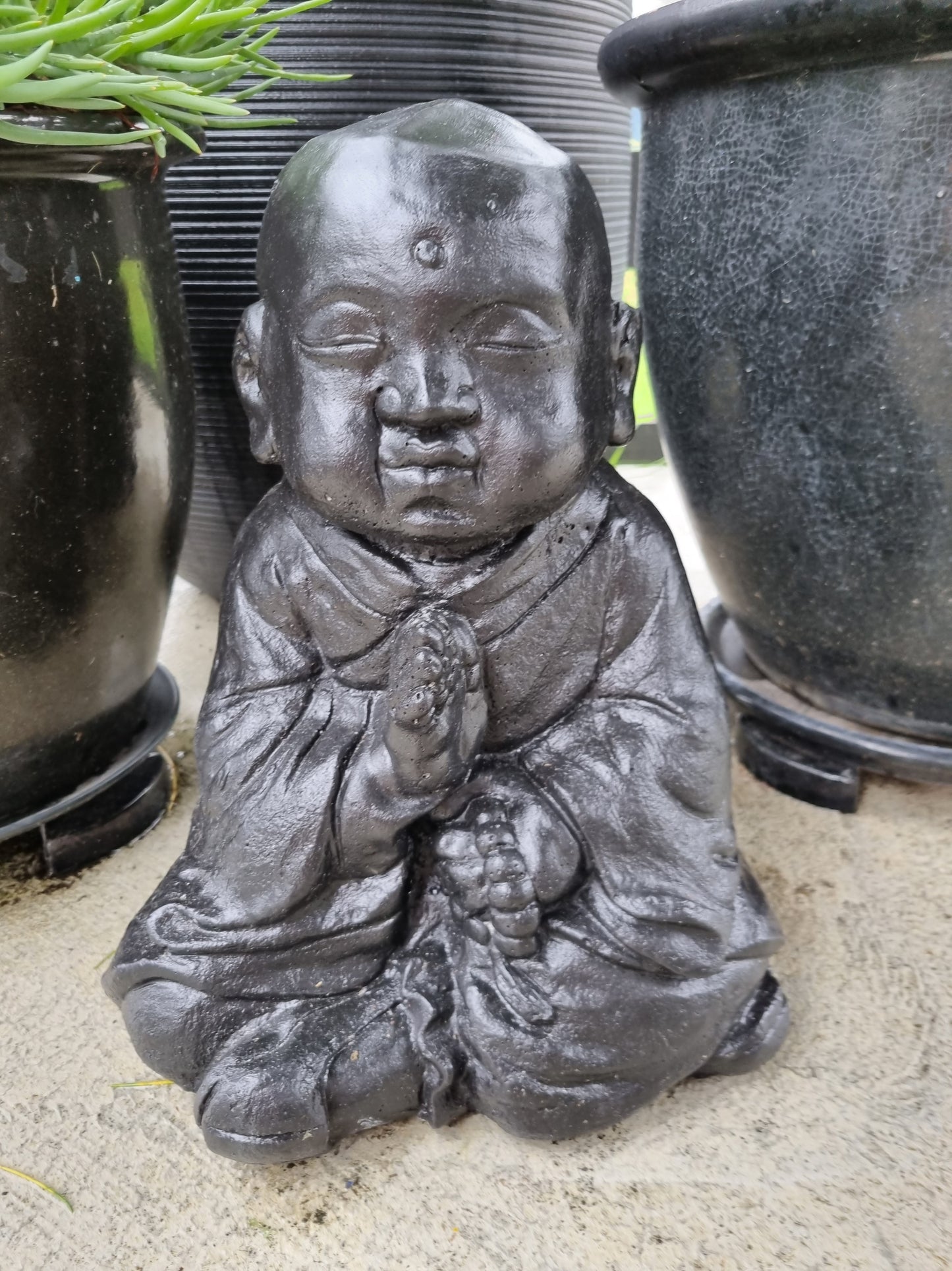 Sitting Buddha Holding Beads - Black