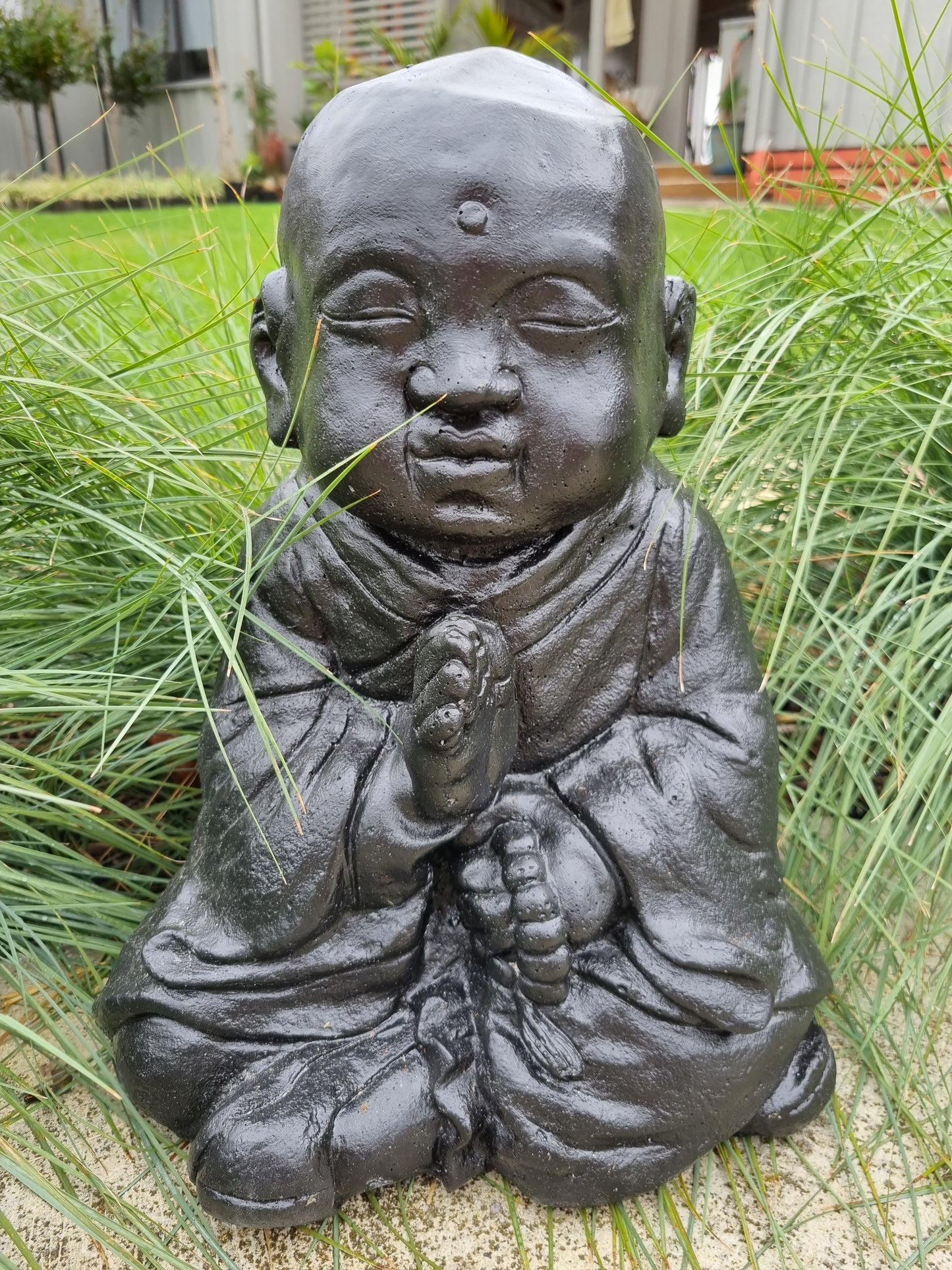 Sitting Buddha Holding Beads - Black